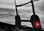 Image of ocean waves on rocky shores Vietnam, 1925, second 15 stock footage video 65675044076