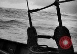 Image of ocean waves on rocky shores Vietnam, 1925, second 16 stock footage video 65675044076