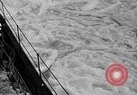 Image of ocean waves on rocky shores Vietnam, 1925, second 17 stock footage video 65675044076