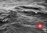 Image of ocean waves on rocky shores Vietnam, 1925, second 21 stock footage video 65675044076