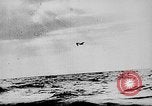 Image of ocean waves on rocky shores Vietnam, 1925, second 23 stock footage video 65675044076
