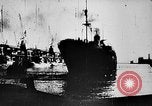 Image of ocean waves on rocky shores Vietnam, 1925, second 36 stock footage video 65675044076