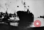 Image of ocean waves on rocky shores Vietnam, 1925, second 37 stock footage video 65675044076