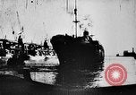 Image of ocean waves on rocky shores Vietnam, 1925, second 38 stock footage video 65675044076