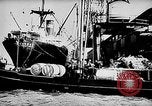 Image of ocean waves on rocky shores Vietnam, 1925, second 55 stock footage video 65675044076