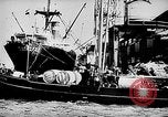 Image of ocean waves on rocky shores Vietnam, 1925, second 56 stock footage video 65675044076