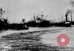 Image of ocean waves on rocky shores Vietnam, 1925, second 59 stock footage video 65675044076