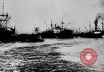 Image of ocean waves on rocky shores Vietnam, 1925, second 60 stock footage video 65675044076