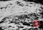 Image of ocean waves on rocky shores Vietnam, 1925, second 61 stock footage video 65675044076