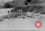 Image of Ho Chi Minh washes his feet Vietnam, 1942, second 1 stock footage video 65675044086