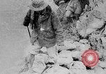 Image of Ho Chi Minh washes his feet Vietnam, 1942, second 4 stock footage video 65675044086