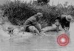 Image of Ho Chi Minh washes his feet Vietnam, 1942, second 6 stock footage video 65675044086