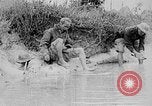 Image of Ho Chi Minh washes his feet Vietnam, 1942, second 9 stock footage video 65675044086