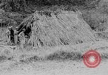 Image of Ho Chi Minh washes his feet Vietnam, 1942, second 16 stock footage video 65675044086