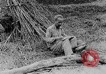 Image of Ho Chi Minh washes his feet Vietnam, 1942, second 22 stock footage video 65675044086
