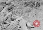 Image of Ho Chi Minh washes his feet Vietnam, 1942, second 28 stock footage video 65675044086