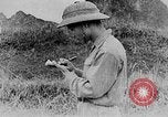 Image of Ho Chi Minh washes his feet Vietnam, 1942, second 31 stock footage video 65675044086