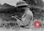 Image of Ho Chi Minh washes his feet Vietnam, 1942, second 32 stock footage video 65675044086