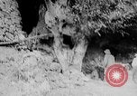 Image of Ho Chi Minh washes his feet Vietnam, 1942, second 38 stock footage video 65675044086