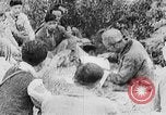 Image of Ho Chi Minh washes his feet Vietnam, 1942, second 58 stock footage video 65675044086