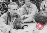 Image of Ho Chi Minh washes his feet Vietnam, 1942, second 62 stock footage video 65675044086