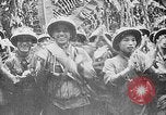 Image of Ho Chi Minh rides pony on jungle trail Vietnam, 1942, second 11 stock footage video 65675044087