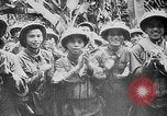 Image of Ho Chi Minh rides pony on jungle trail Vietnam, 1942, second 14 stock footage video 65675044087