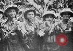 Image of Ho Chi Minh rides pony on jungle trail Vietnam, 1942, second 15 stock footage video 65675044087
