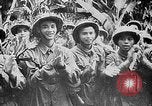 Image of Ho Chi Minh rides pony on jungle trail Vietnam, 1942, second 16 stock footage video 65675044087