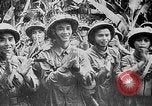 Image of Ho Chi Minh rides pony on jungle trail Vietnam, 1942, second 17 stock footage video 65675044087