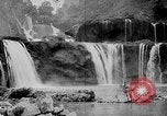 Image of Ho Chi Minh rides pony on jungle trail Vietnam, 1942, second 30 stock footage video 65675044087
