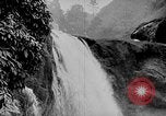 Image of Ho Chi Minh rides pony on jungle trail Vietnam, 1942, second 33 stock footage video 65675044087