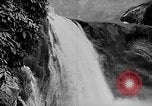 Image of Ho Chi Minh rides pony on jungle trail Vietnam, 1942, second 34 stock footage video 65675044087