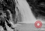 Image of Ho Chi Minh rides pony on jungle trail Vietnam, 1942, second 36 stock footage video 65675044087