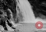 Image of Ho Chi Minh rides pony on jungle trail Vietnam, 1942, second 37 stock footage video 65675044087