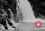 Image of Ho Chi Minh rides pony on jungle trail Vietnam, 1942, second 38 stock footage video 65675044087