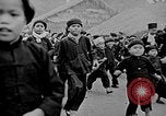 Image of Vietnamese children run to see event Vietnam, 1954, second 3 stock footage video 65675044095