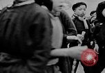 Image of Vietnamese children run to see event Vietnam, 1954, second 5 stock footage video 65675044095