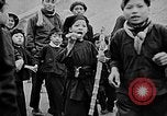 Image of Vietnamese children run to see event Vietnam, 1954, second 11 stock footage video 65675044095