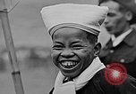 Image of Vietnamese children run to see event Vietnam, 1954, second 15 stock footage video 65675044095