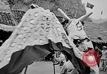 Image of Vietnamese children run to see event Vietnam, 1954, second 18 stock footage video 65675044095