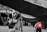 Image of Vietnamese children run to see event Vietnam, 1954, second 21 stock footage video 65675044095