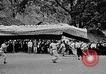 Image of Vietnamese children run to see event Vietnam, 1954, second 23 stock footage video 65675044095