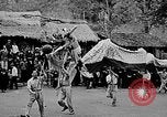 Image of Vietnamese children run to see event Vietnam, 1954, second 27 stock footage video 65675044095