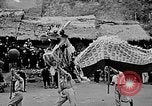Image of Vietnamese children run to see event Vietnam, 1954, second 28 stock footage video 65675044095