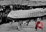 Image of Vietnamese children run to see event Vietnam, 1954, second 30 stock footage video 65675044095