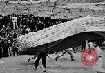 Image of Vietnamese children run to see event Vietnam, 1954, second 31 stock footage video 65675044095