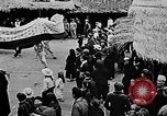 Image of Vietnamese children run to see event Vietnam, 1954, second 36 stock footage video 65675044095