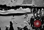 Image of Vietnamese children run to see event Vietnam, 1954, second 37 stock footage video 65675044095