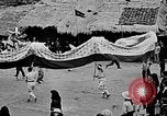Image of Vietnamese children run to see event Vietnam, 1954, second 38 stock footage video 65675044095